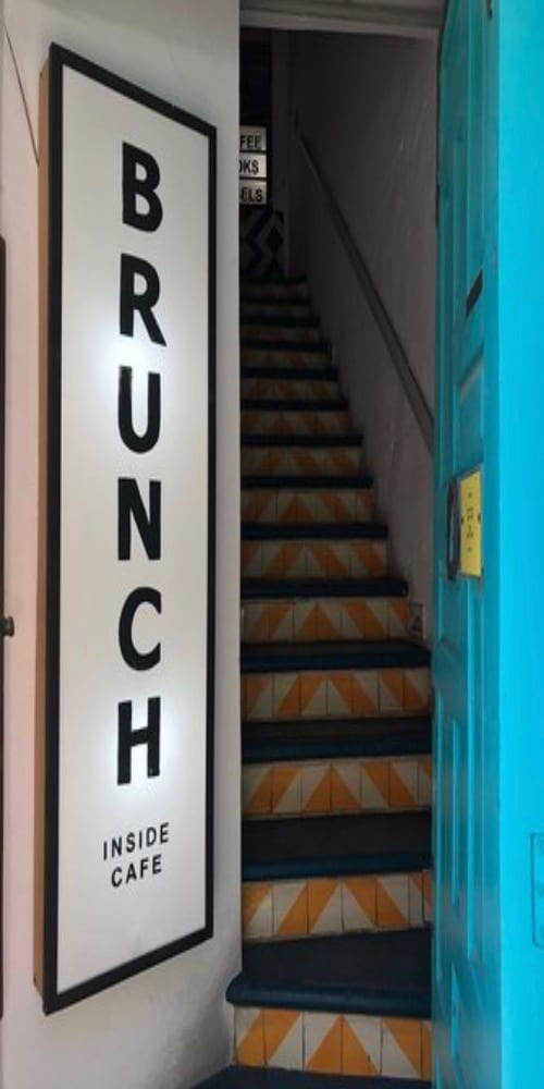 secret staircase to inside cafe