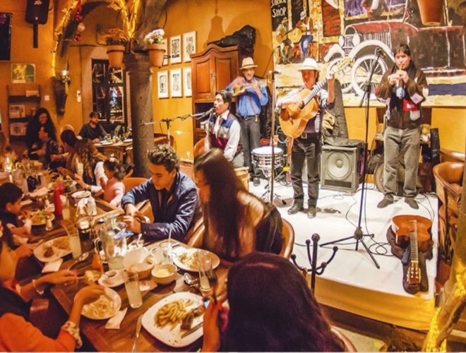 Inside of restaurant Mama Mia with mariachis